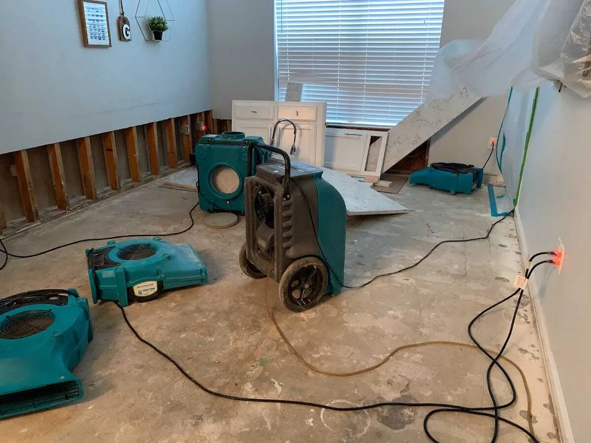 Dehumidifier in flood-cut room for Water Damage Restoration in Eastampton